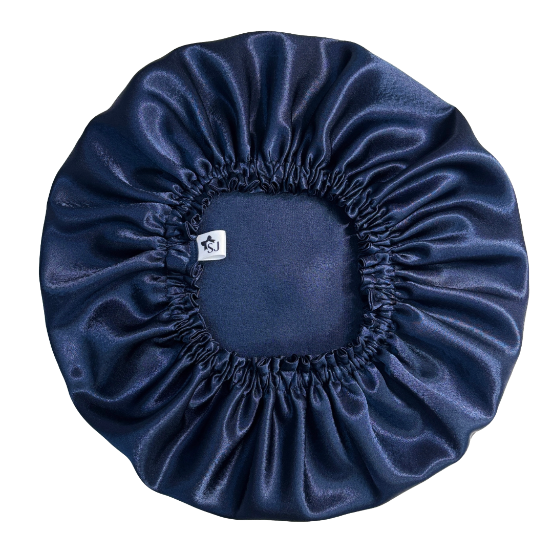 Navy blue satin bonnet on female Mannequin 