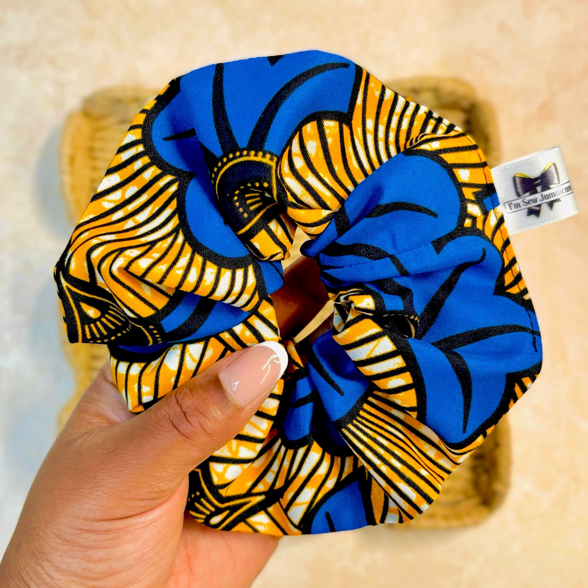 African Print hair scrunchie in hand