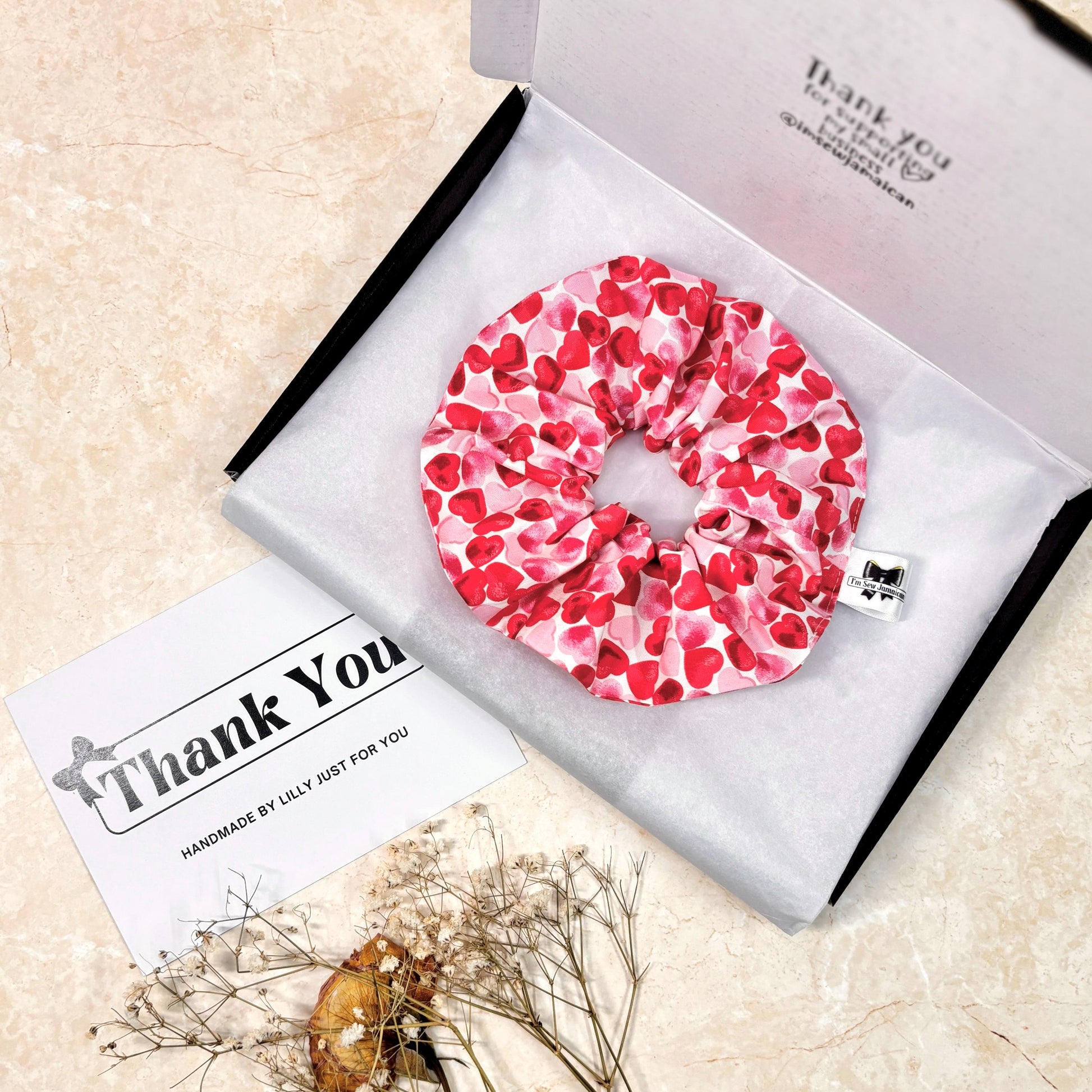 Cotton heart scrunchie in small postal box packaging in white tissue paper, and thank you card.