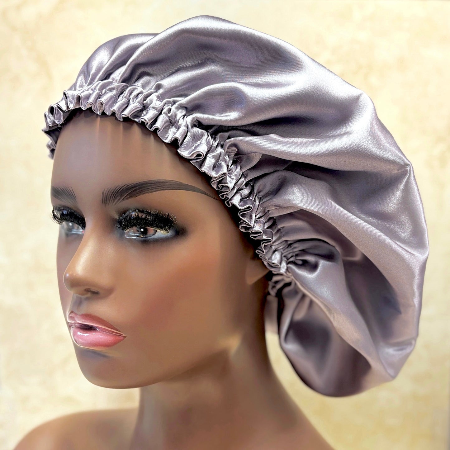 Lilac satin bonnet on mannequin